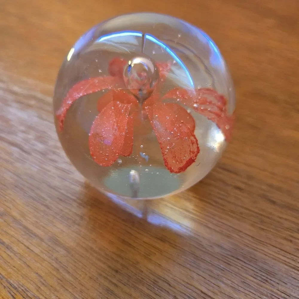 VINTAGE ART GLASS PAPERWEIGHT WITH ORANGE FLOWER INSIDE